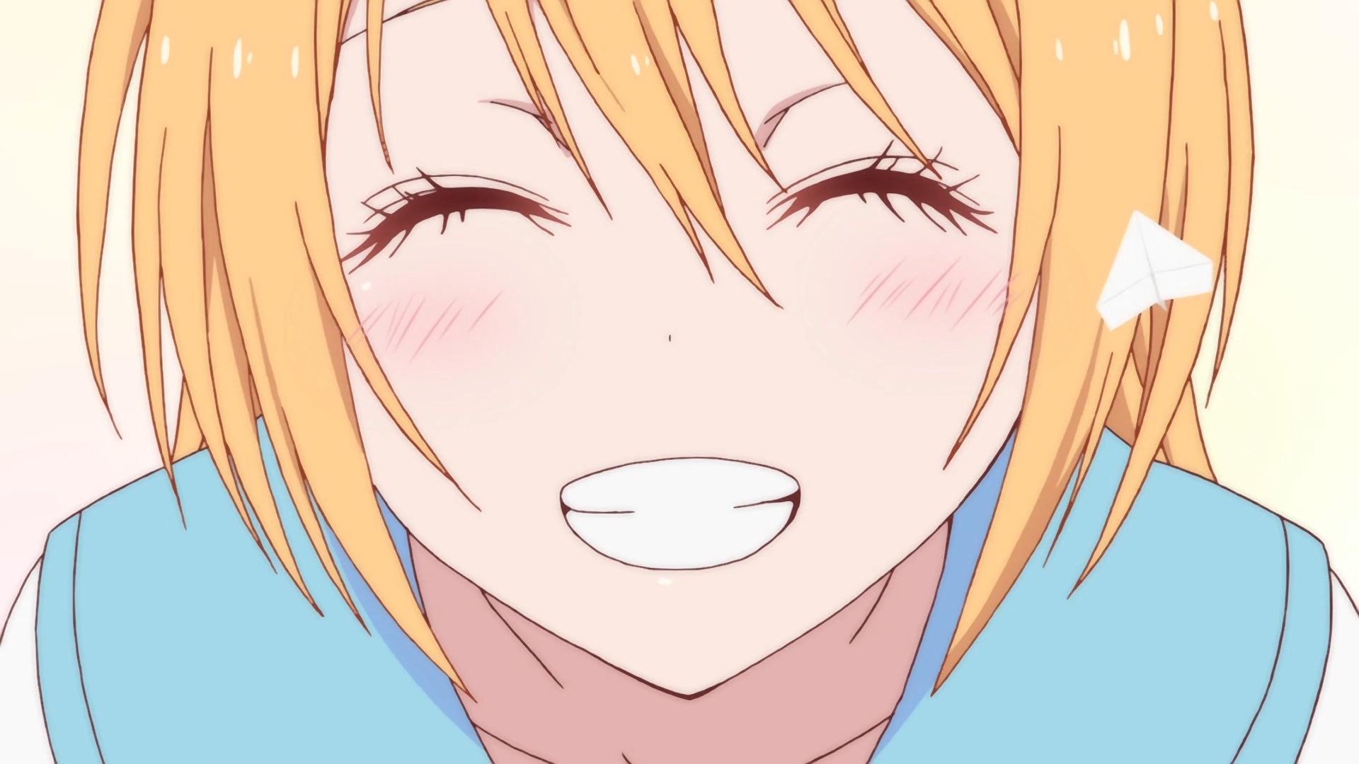 Close-up of Chitoge Kirisaki from the anime Nisekoi, smiling brightly with eyes closed and a light blush on her cheeks.