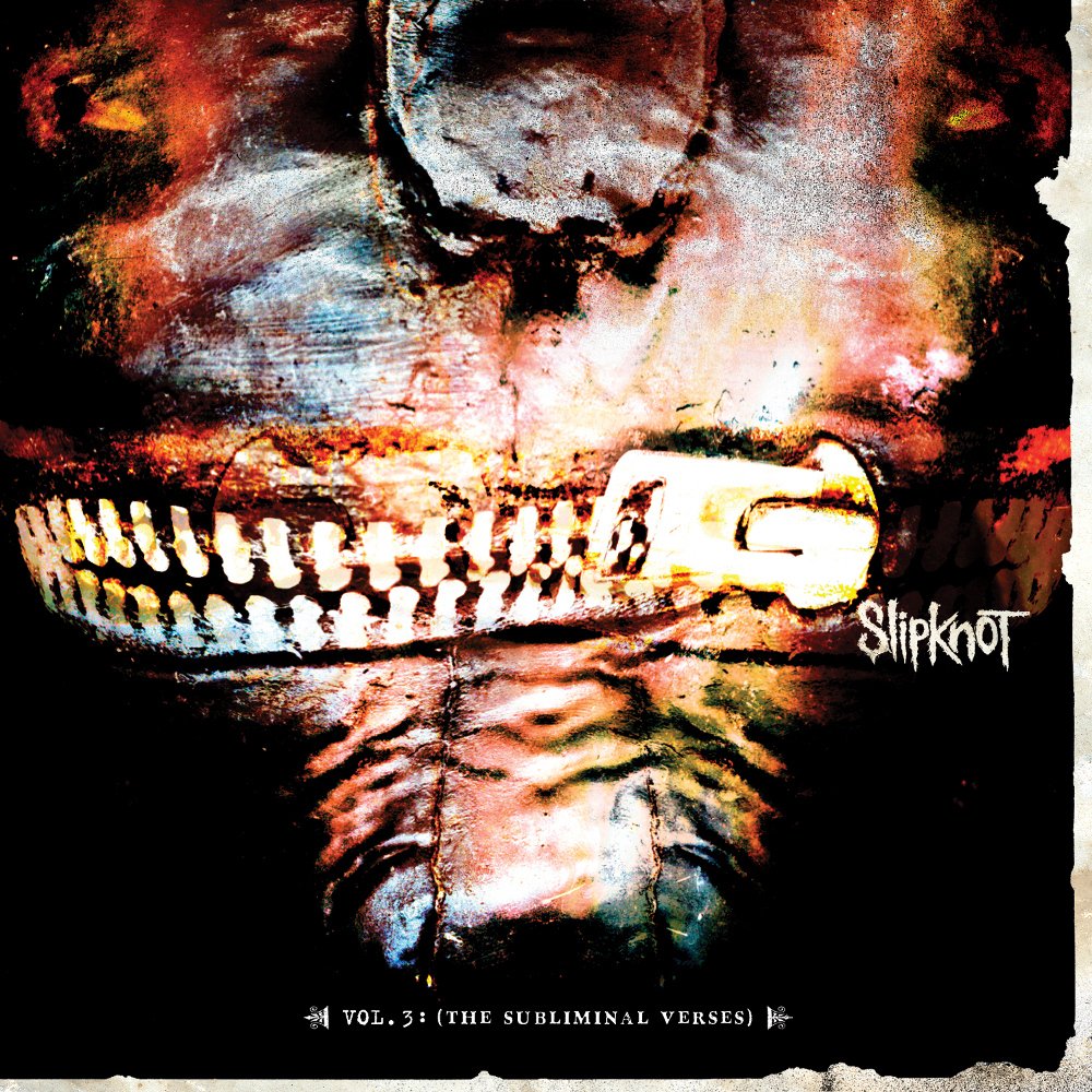 Slipknot album cover: distorted stitched mask with zipper mouth, fiery, gritty industrial/nu‑metal heavy music aesthetic.
