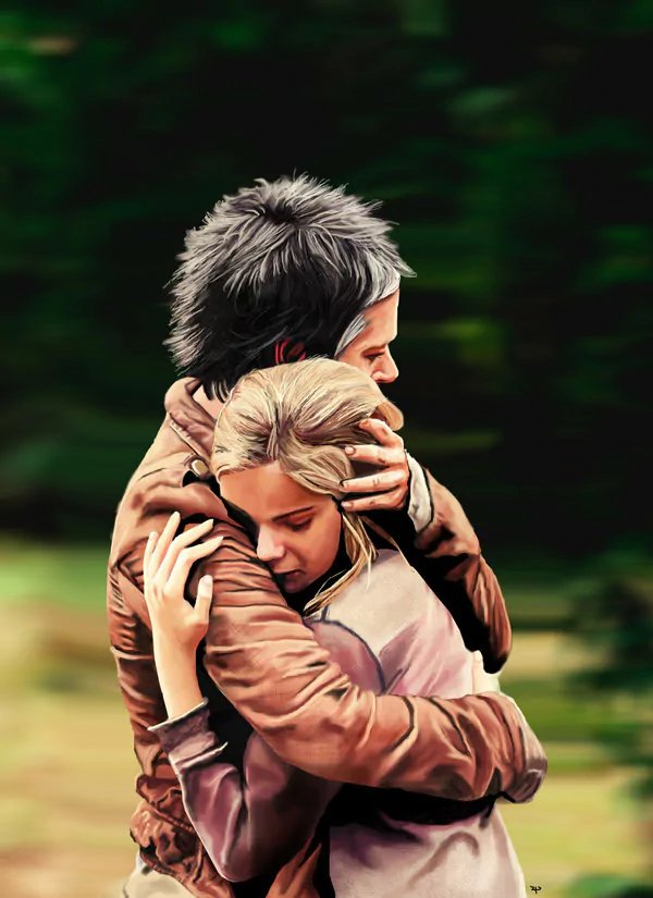 Two characters from the TV show The Walking Dead share a tight, emotional hug against a blurred green forest background.