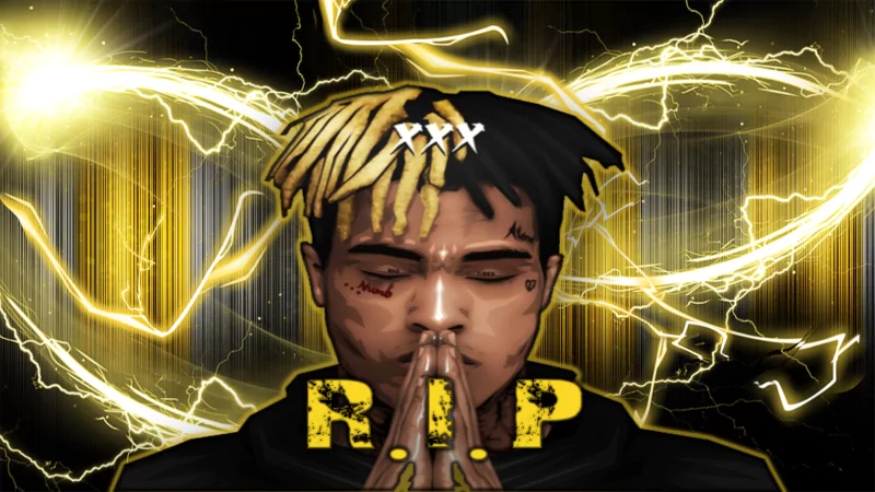 Digital artwork of XXXTentacion with hands in prayer, surrounded by glowing yellow lightning and the text R.I.P, symbolizing his impact on music.