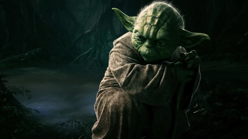 A wise Jedi from the Star Wars universe, Yoda has pointed ears and a green complexion, set against a mystical, dark backdrop that reflects his deep connection to the Force.