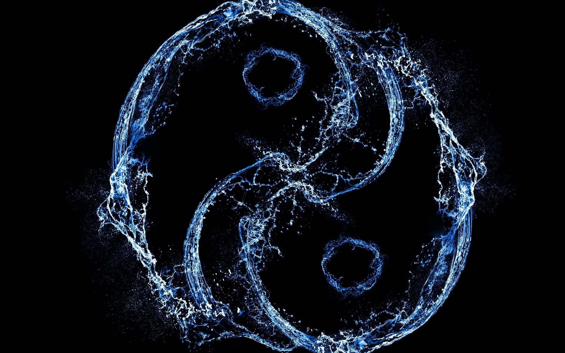 A dynamic representation of the Yin & Yang symbol, created with water splashes, set against a black background, symbolizing balance and harmony in the context of religious beliefs.