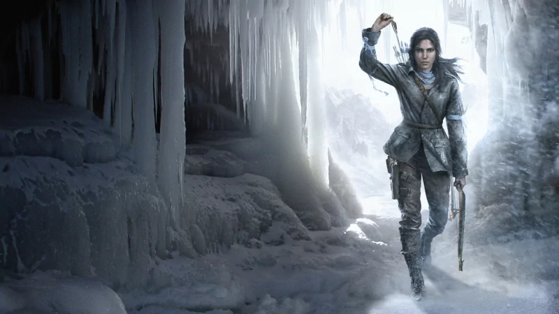 Lara Croft navigates a frozen cave in Rise of the Tomb Raider, showcasing her adventurous spirit and determination amidst icy landscapes and dramatic lighting.