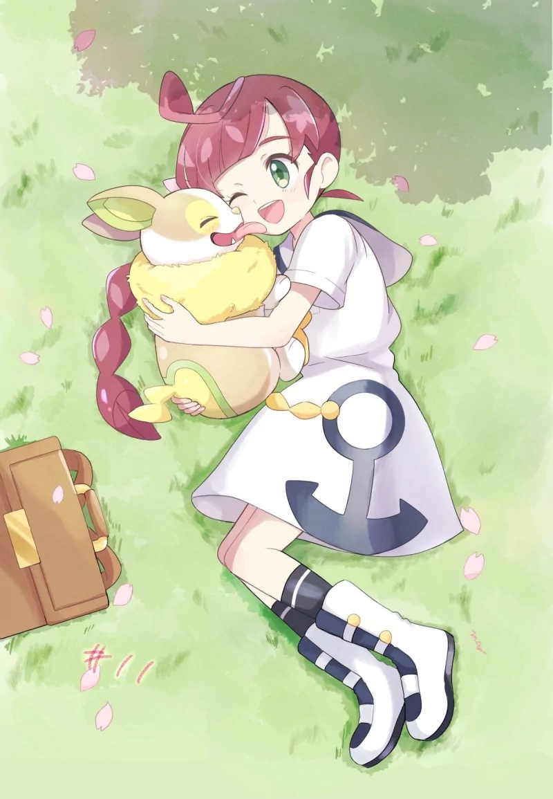 Chloe (Koharu) lying on grass, green-eyed, hugging a fluffy Yamper — cute anime Pokémon scene with her schoolbag and falling cherry blossoms.