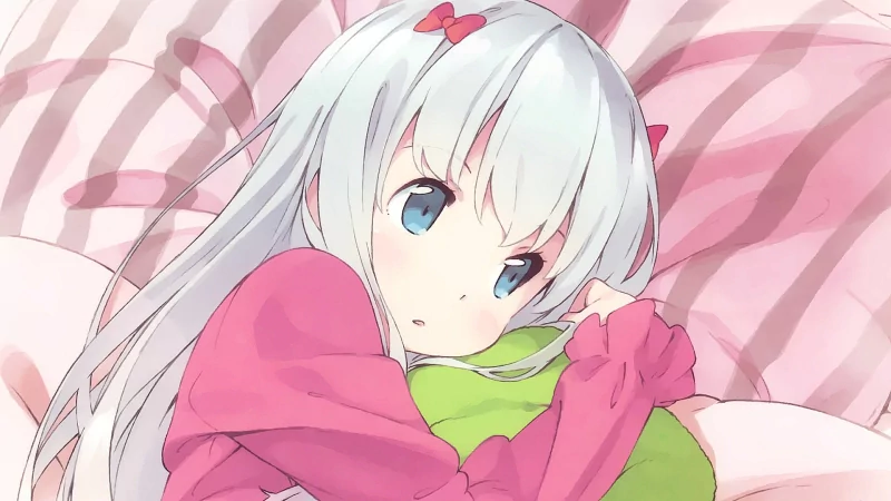 Sagiri Izumi, a character from the anime EroManga-Sensei, is shown lying down with a pink bow in her white hair and wearing a pink outfit.