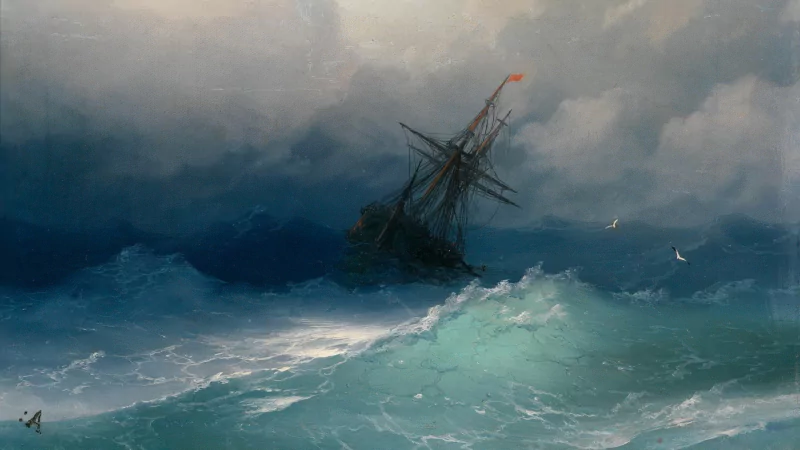 A sailboat battles towering waves on a stormy sea under dark, turbulent skies.