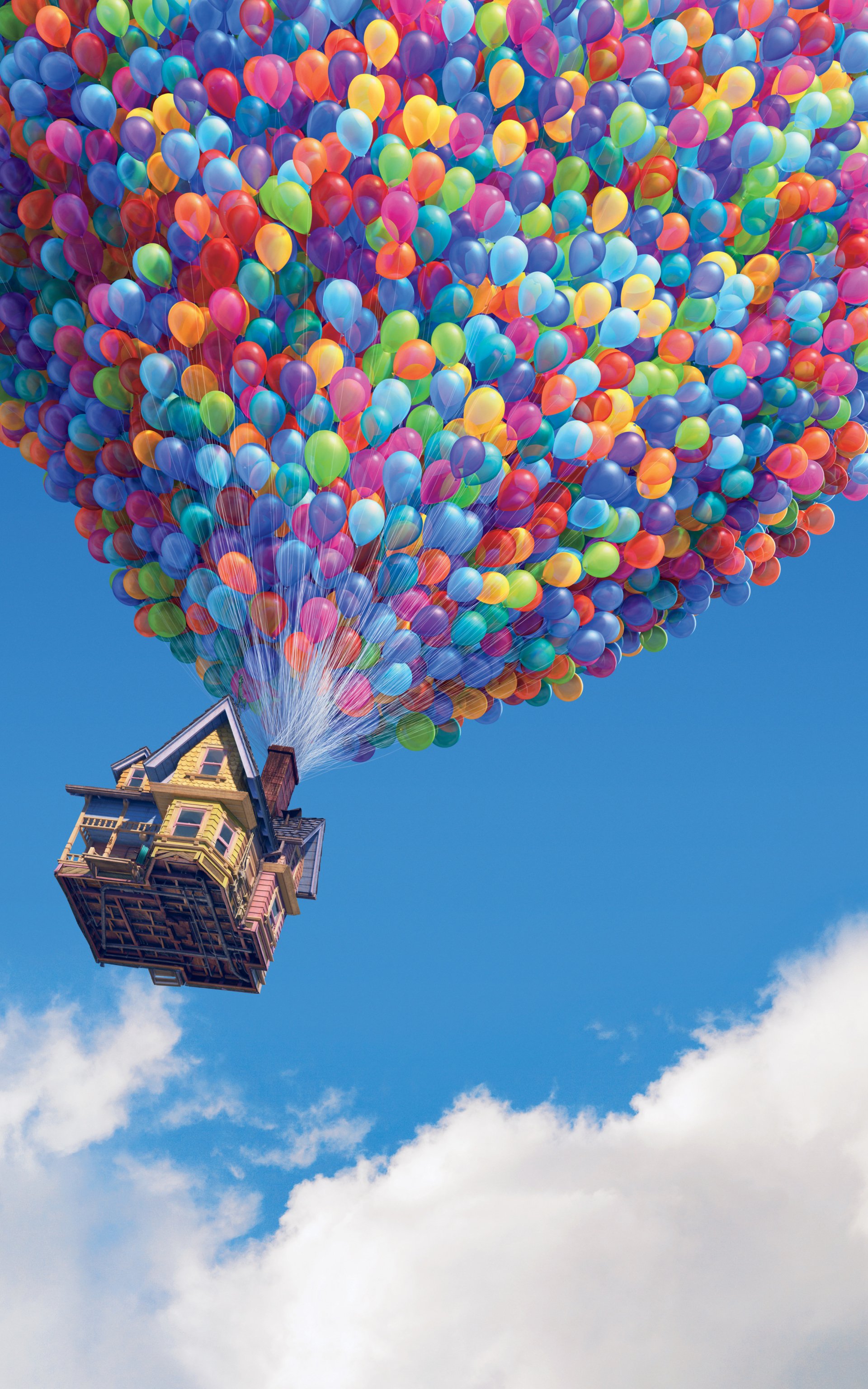 Scene from the movie Up (2009): a quaint wooden house lifted into a bright blue sky, buoyed by thousands of colorful balloons.