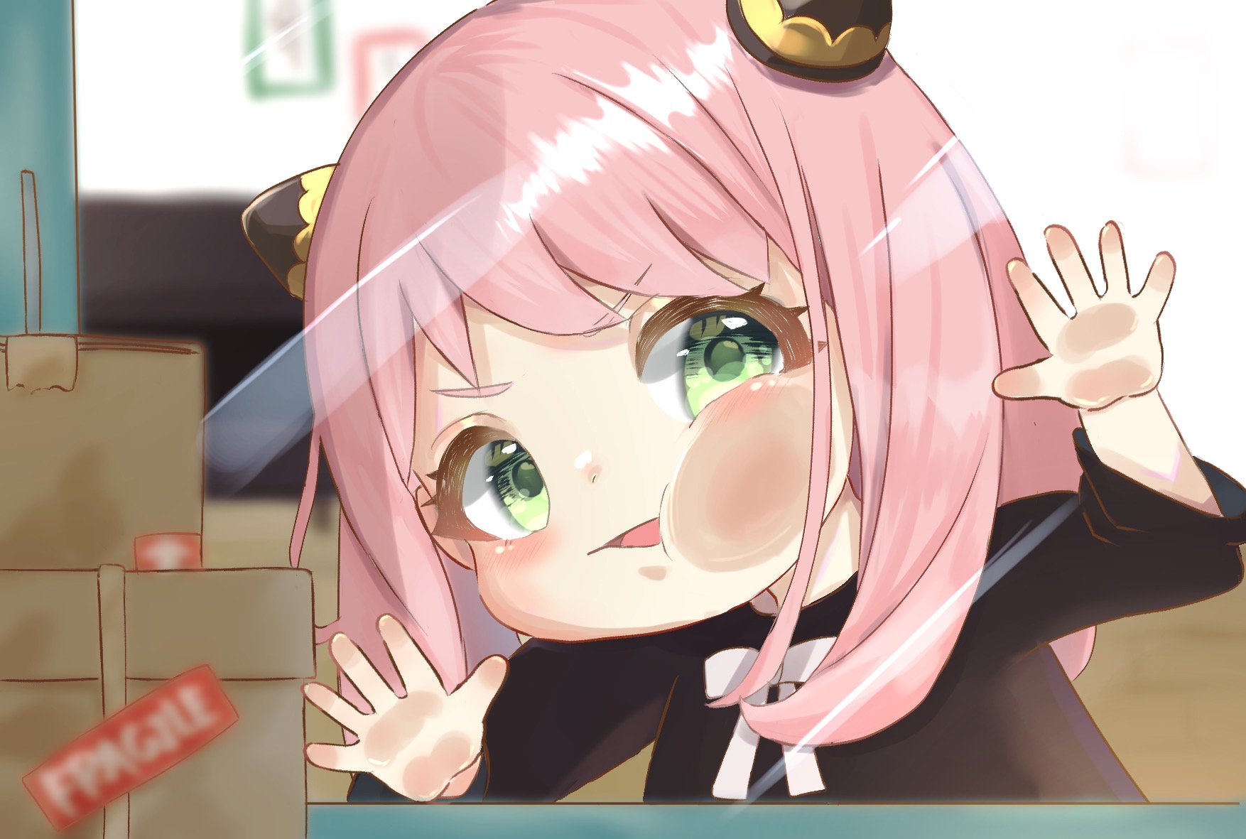 Anya Forger from Spy x Family presses her face and hands against a window, pink hair and green eyes, playful expression, cardboard boxes labeled fragile nearby.