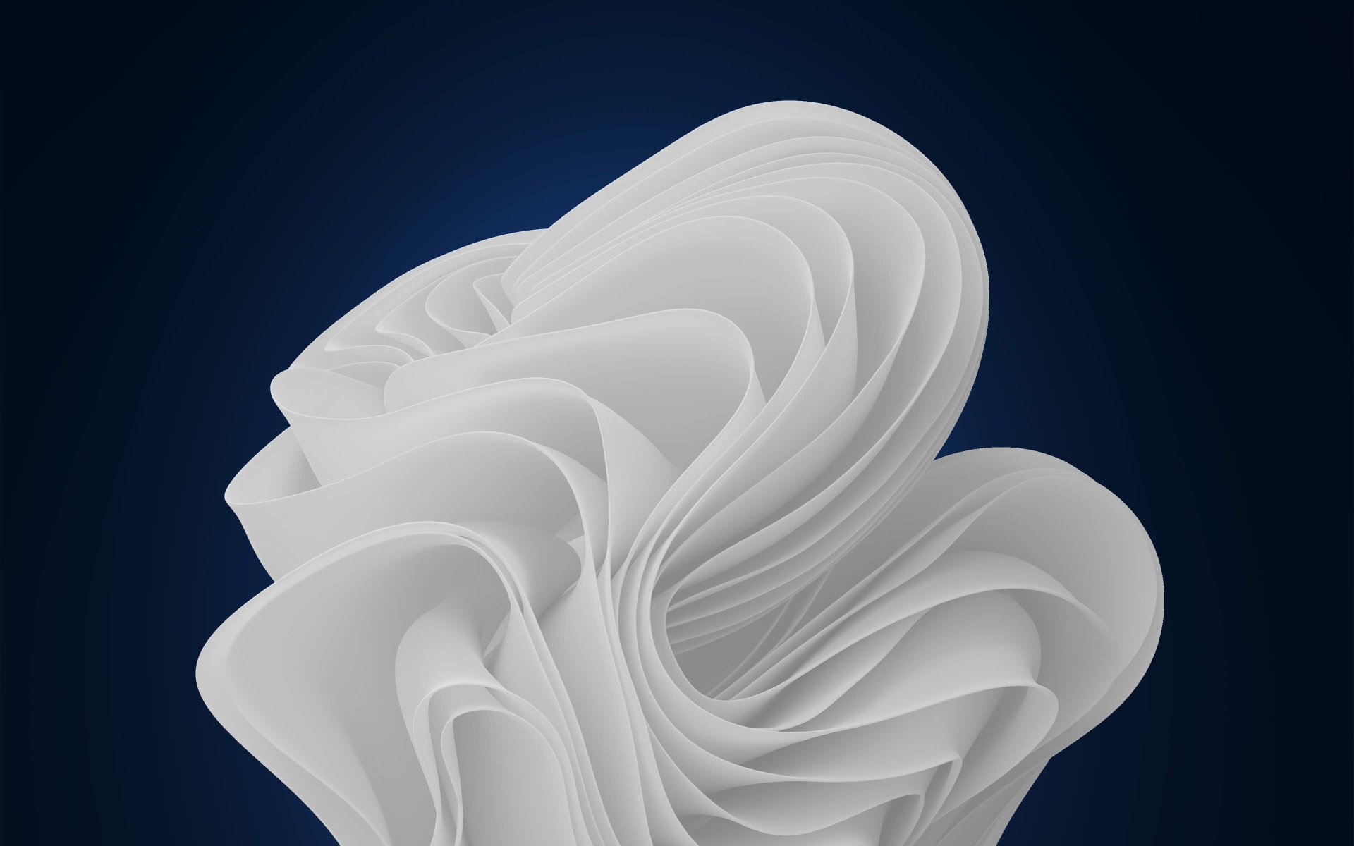 Abstract white swirling shape against a dark blue background, representing the modern design aesthetic of Windows 11 technology.