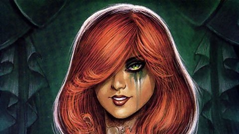 Comic, Dawn (Comics): close-up of Dawn with flowing red hair, glowing green eyes, a green tear streak down her cheek and dark feathered wings behind her.