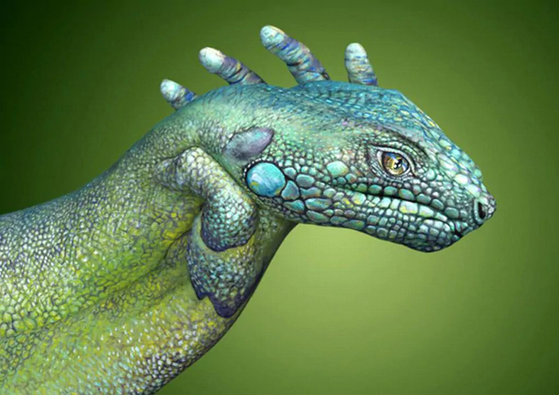 Abstract image of a hand creatively transformed into a reptile head, blending textures and shapes to form a mind teaser.