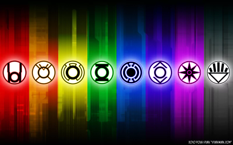 Comic, DC Comics — a row of Lantern Corps emblems across a vertical rainbow gradient.