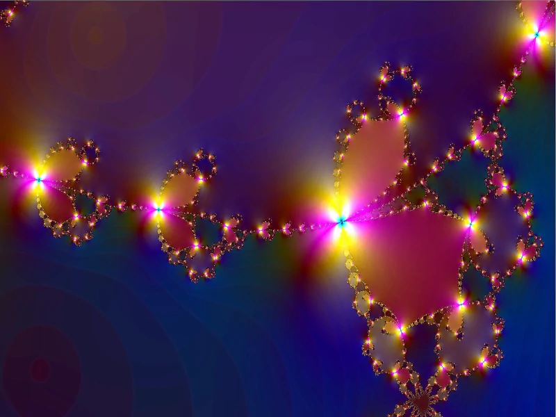 A vibrant digital art piece featuring intricate, colorful fractal patterns set against a deep blue background, radiating light and showcasing artistic creativity.