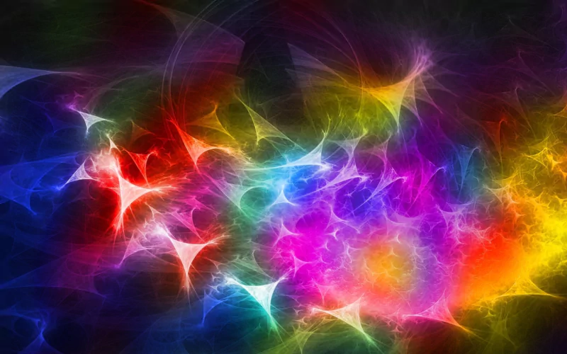 A vibrant display of digital art featuring swirling colors and abstract shapes, radiating a sense of energy and creativity against a dark background.