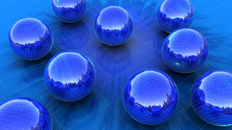 A digital art piece featuring a cluster of reflective blue spheres arranged on a geometric grid, set against a vibrant blue background.