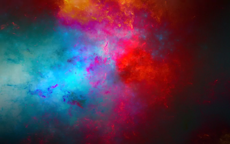 A vibrant explosion of colors in an abstract digital art piece, blending hues of blue, red, and orange against a dark backdrop, creating a dynamic and visually captivating composition.