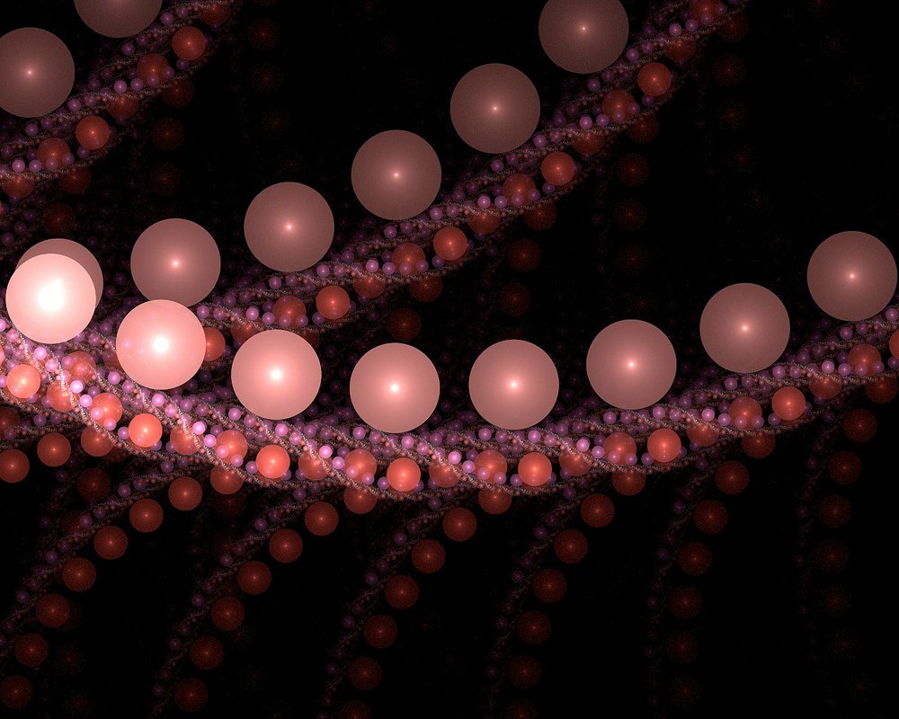 An abstract fractal design featuring swirling patterns composed of colorful spheres, set against a dark background, creating a vibrant, dynamic visual experience.