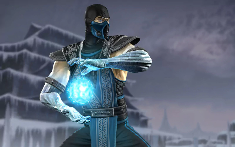 A character from the Mortal Kombat video game stands ready, glowing blue energy forming in his hands against a misty, mountainous background.