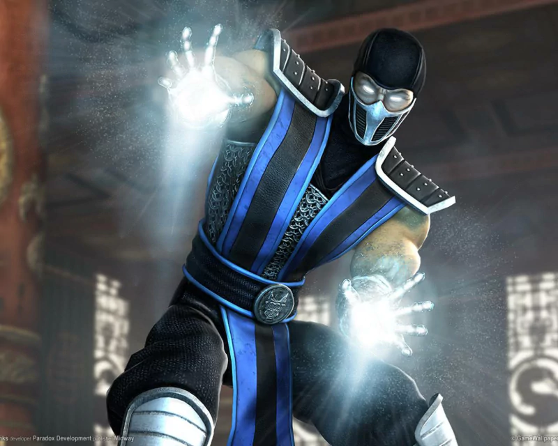 A character from the video game Mortal Kombat, dressed in blue and black, channels icy energy from his hands, showcasing his powerful abilities.