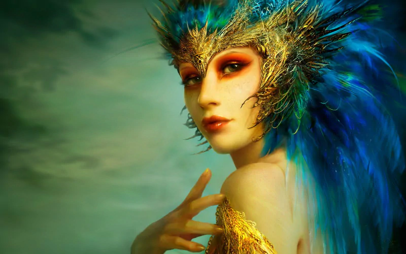 A fantasy woman adorned with vibrant blue and gold feathers, her intense gaze framed by an elaborate feathered headdress against a misty green background.
