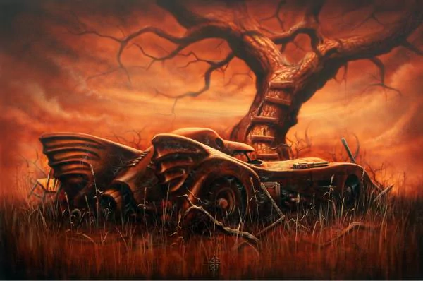 A weathered Batmobile rests in a desolate landscape, its iconic design blending with a haunting, orange-hued backdrop and a gnarled tree, evoking a striking comic book scene.