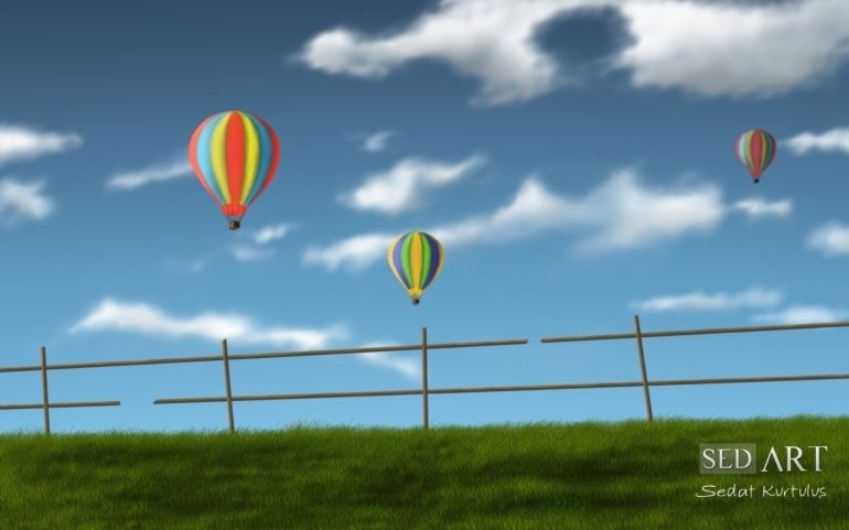 Three colorful hot air balloons float against a bright blue sky, above a green grassy field and a rustic wooden fence.