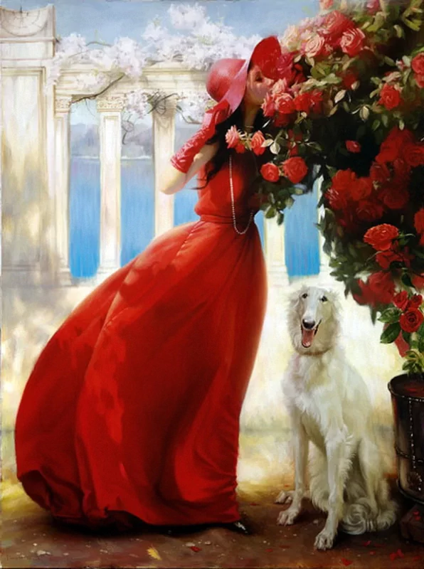 A woman in a red dress and hat leans toward a blooming rose bush, with a white dog sitting beside her, surrounded by a picturesque garden setting.