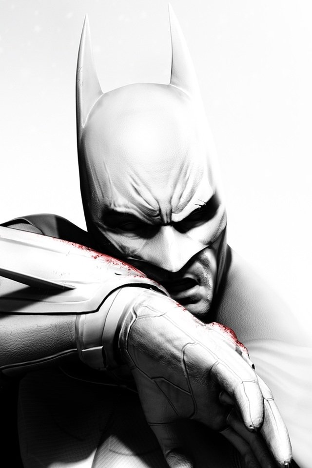 Monochrome close-up of Batman from the video game Batman: Arkham City, grimacing with blood smeared across his gauntlet and forearm.