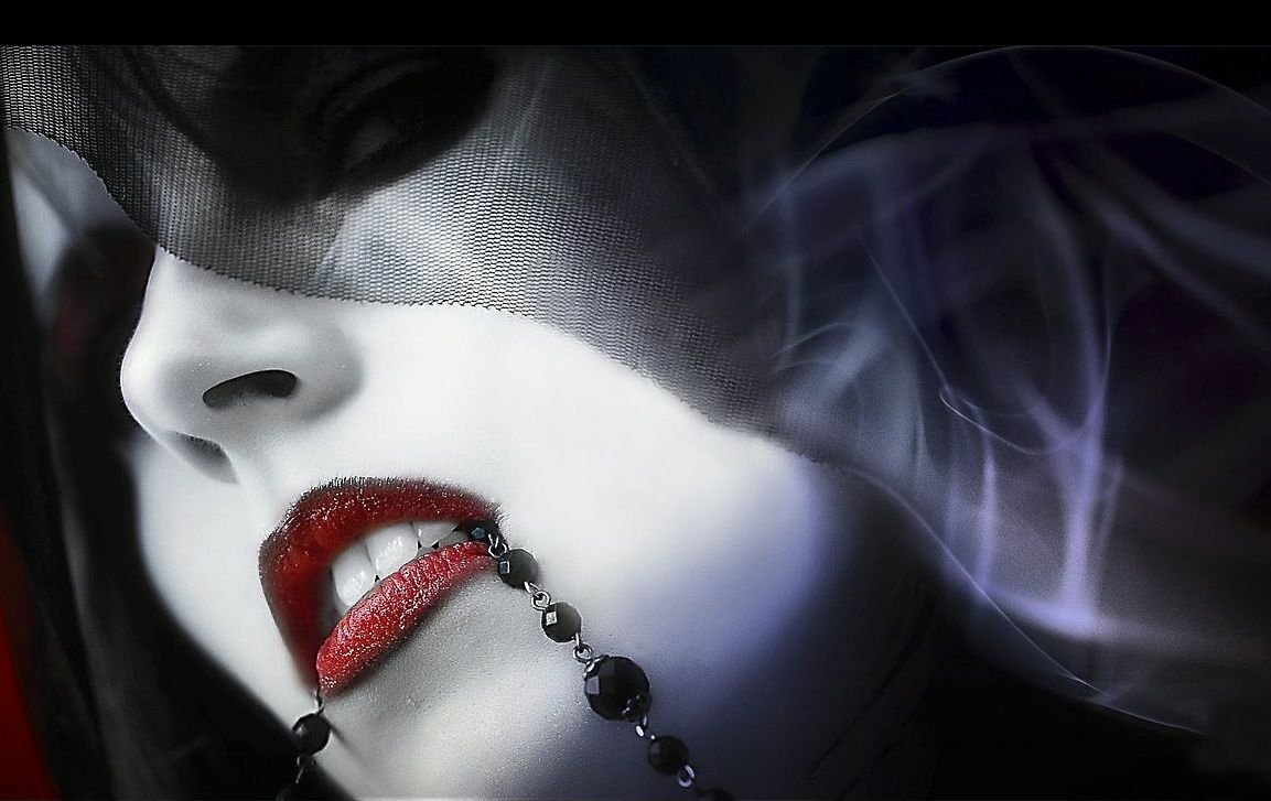 A close-up of a woman in a dark veil, with striking red lips. A chain hangs from her mouth, adding a dramatic and mysterious touch to the composition.