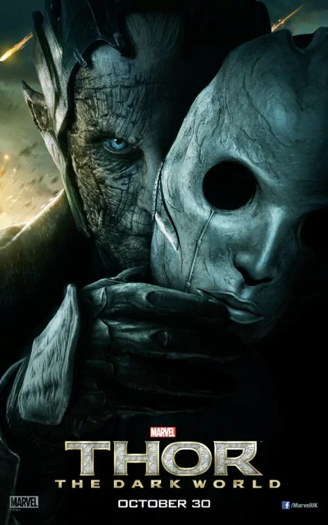 Close-up of a dark, cracked face holding a smooth, expressionless mask, with the title Thor: The Dark World and release date below.