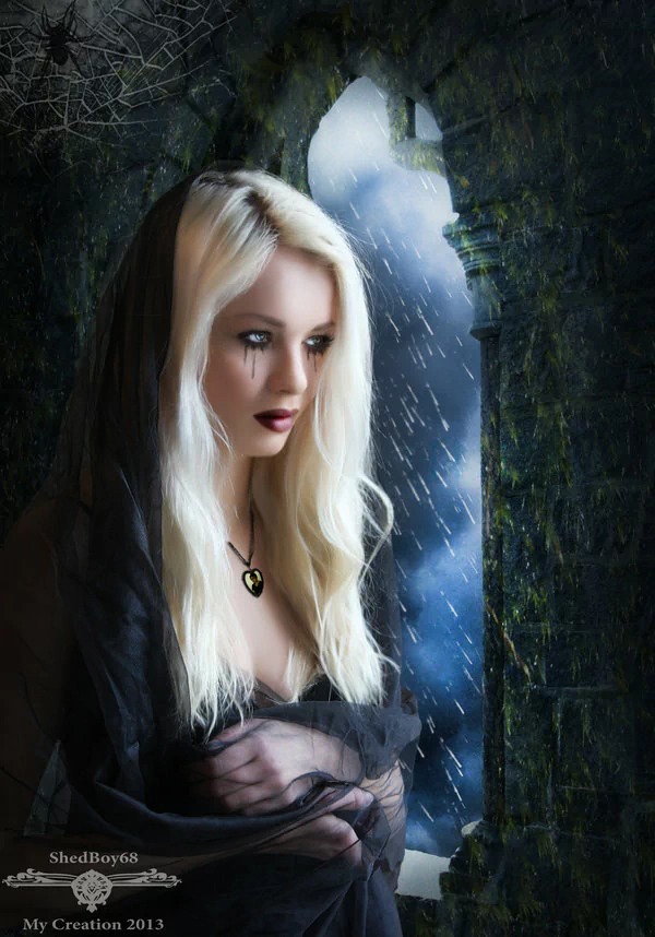 A gothic woman with long, flowing blonde hair gazes pensively out of a stone window, rain falling around her, while draped in a dark, sheer veil.