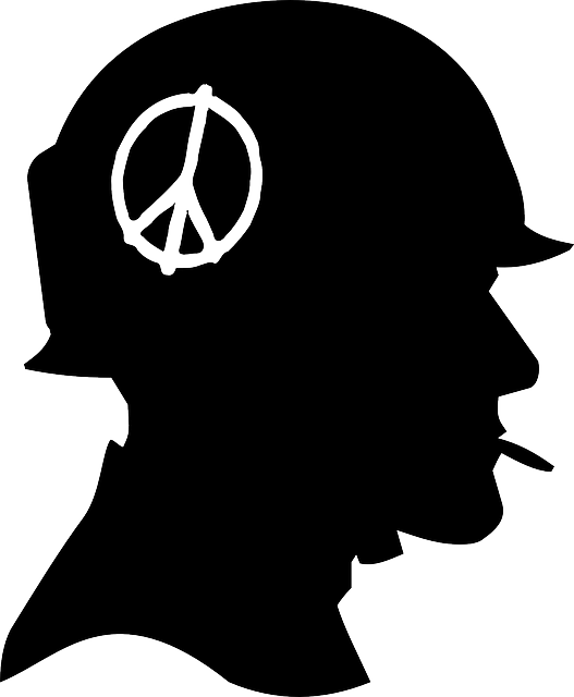 Silhouette of a separate military soldier wearing a helmet with a peace symbol and smoking a cigarette.