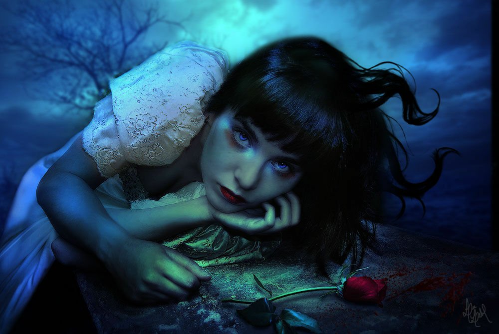 A gothic scene featuring a woman with dark hair, resting on a grave with a single rose beside her, evokes a fantasy atmosphere under a haunting blue sky.