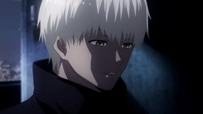 Ken Kaneki from the anime Tokyo Ghoul appears in a shadowy environment, with his distinctive white hair and serious expression, embodying the show's dark themes.