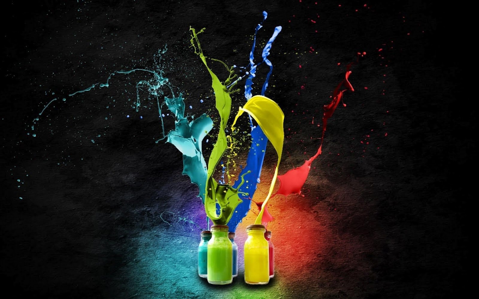 Artistic splashes of vibrant blue, yellow, and red colors burst dynamically from three paint bottles against a dark background.