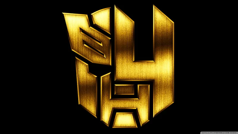 Golden emblem of the Autobots from the movie Transformers: Age of Extinction on a black background.