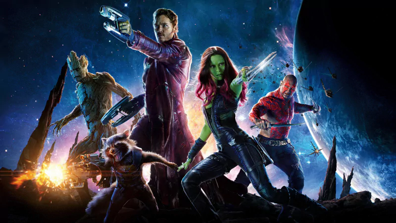 Guardians of the Galaxy movie poster: five spacefaring heroes—Star-Lord, Gamora, Drax, Rocket and Groot—pose on a rocky outcrop against a vivid cosmic backdrop.
