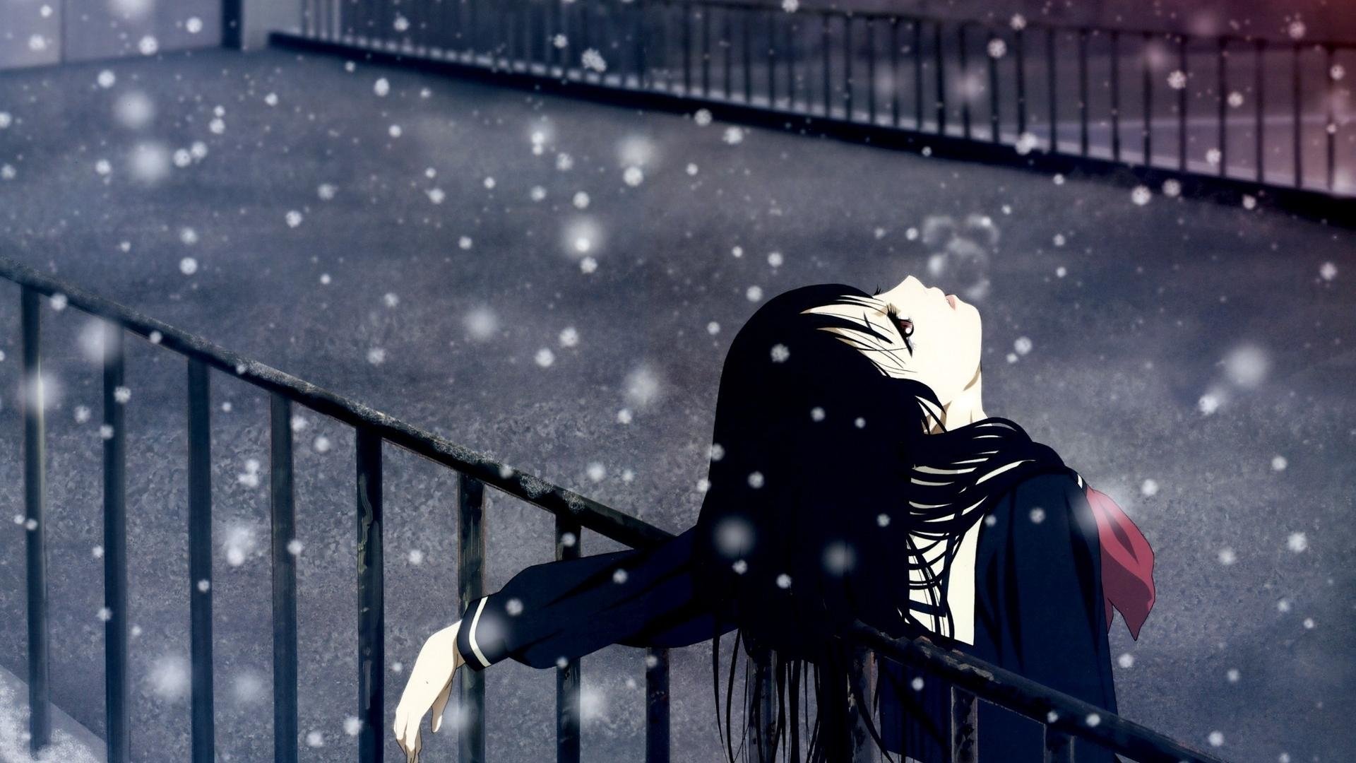 Anime — Jigoku Shōjo: Enma Ai in a school uniform leans back over a railing as snow falls, face uplifted and long black hair trailing.