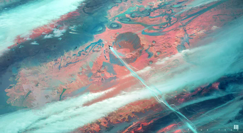 Colorful sci‑fi digital art of an abstract alien planet landscape: coral and teal swirls, cloud bands, and a bright beam cutting across the scene.