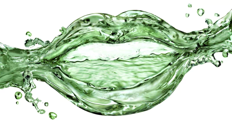An abstract artistic representation of water, capturing fluid movement that resembles a kiss, with vibrant green hues and dynamic splashes.