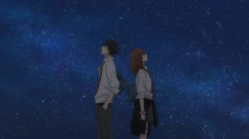 Two characters from the anime Ao Haru Ride stand back-to-back under a starry night sky.