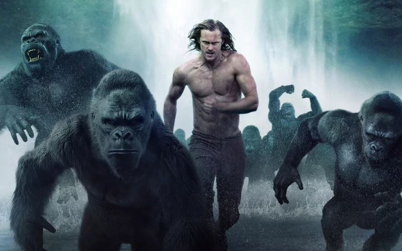 Alexander Skarsgård stars as Tarzan, surrounded by powerful gorillas in a dynamic scene from *The Legend of Tarzan*, capturing the intensity of the jungle adventure.