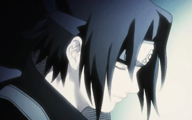 Sasuke Uchiha from Naruto is depicted in profile, showcasing his Sharingan. The image captures a moment of reflection in this iconic anime series.