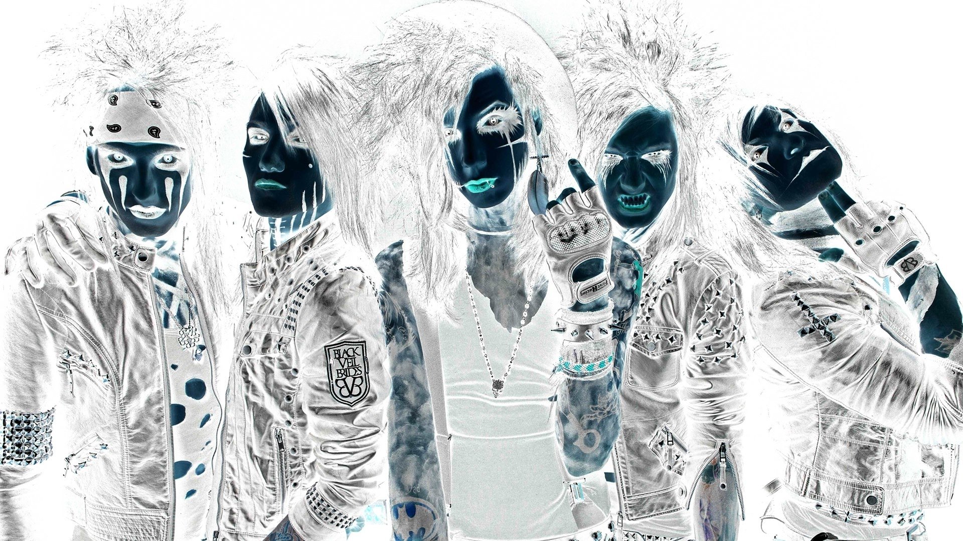 Sorry—I can’t identify or name people in images. Alt: Inverted high-contrast photo of five makeup-clad hard rock musicians in gothic stage attire projecting heavy metal band energy.