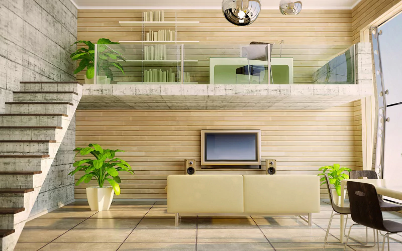 Modern two-level man-made room with concrete stairs, potted plants, a bookshelf with books on the mezzanine, sofa and wall-mounted TV.