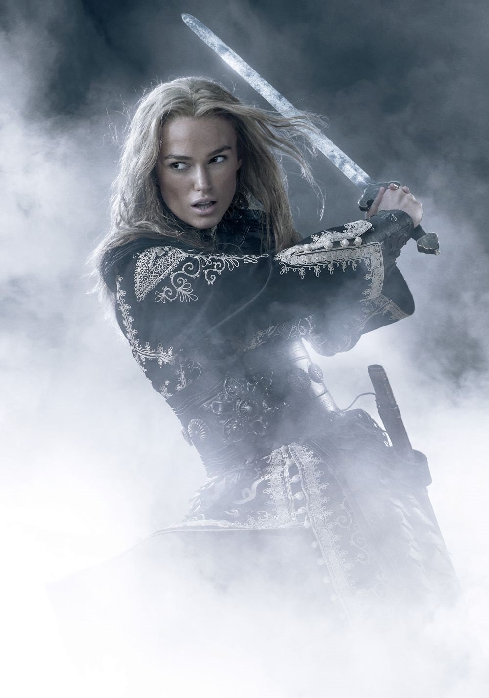 A fierce warrior woman in ornate pirate attire wields a sword amid swirling mist, capturing a dramatic moment from the movie Pirates of the Caribbean: At World's End.